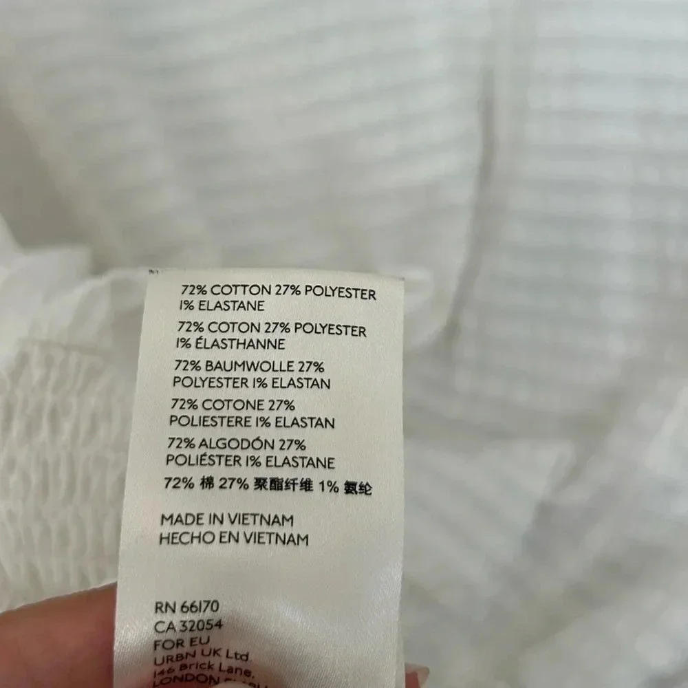Anthropologie Rebecca smocked top puff sleeves white size small